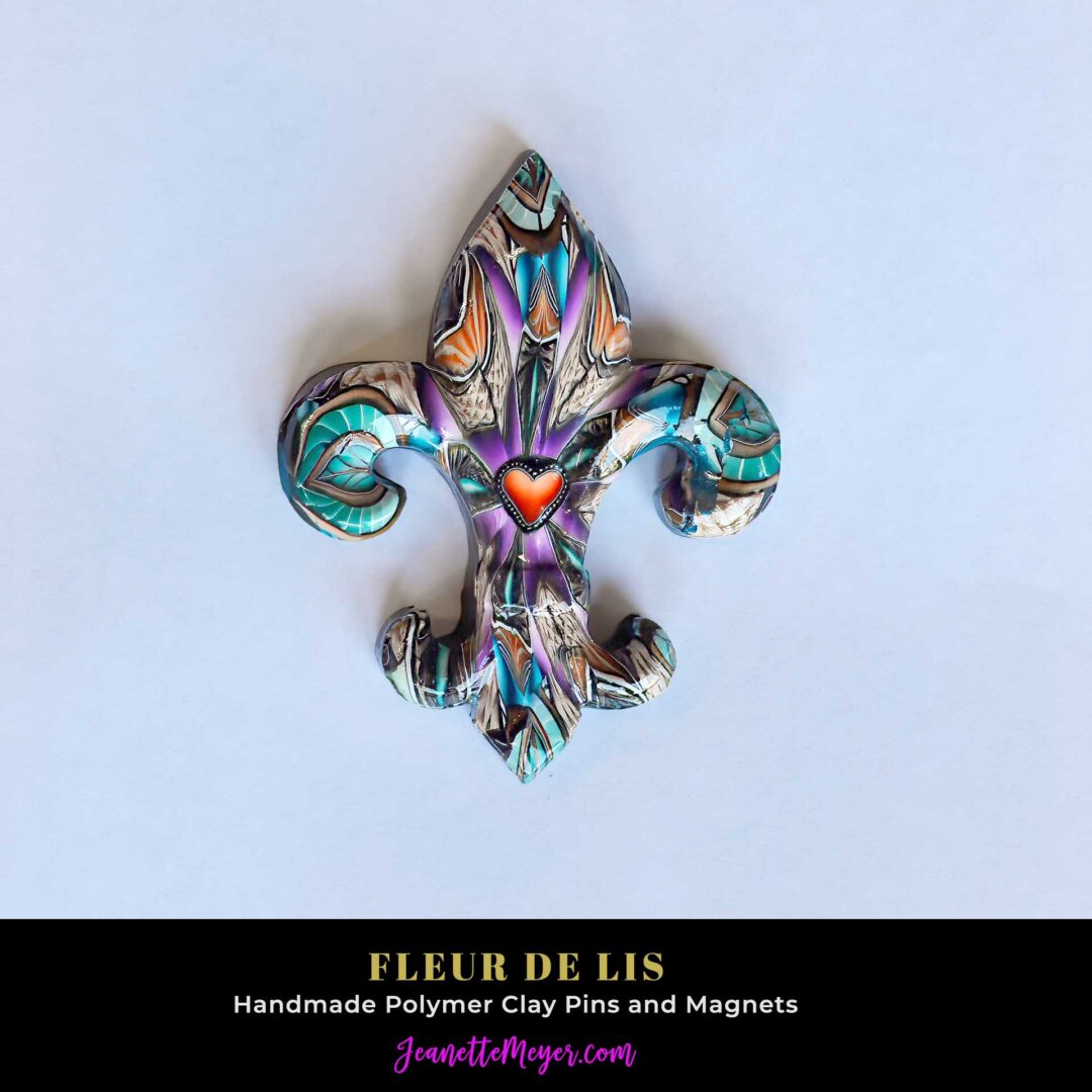 Handmade polymer clay fleur-de-lis pin by New Orleans artist Jeanette Meyer. A colorful, collectible design available as both pins and magnets.