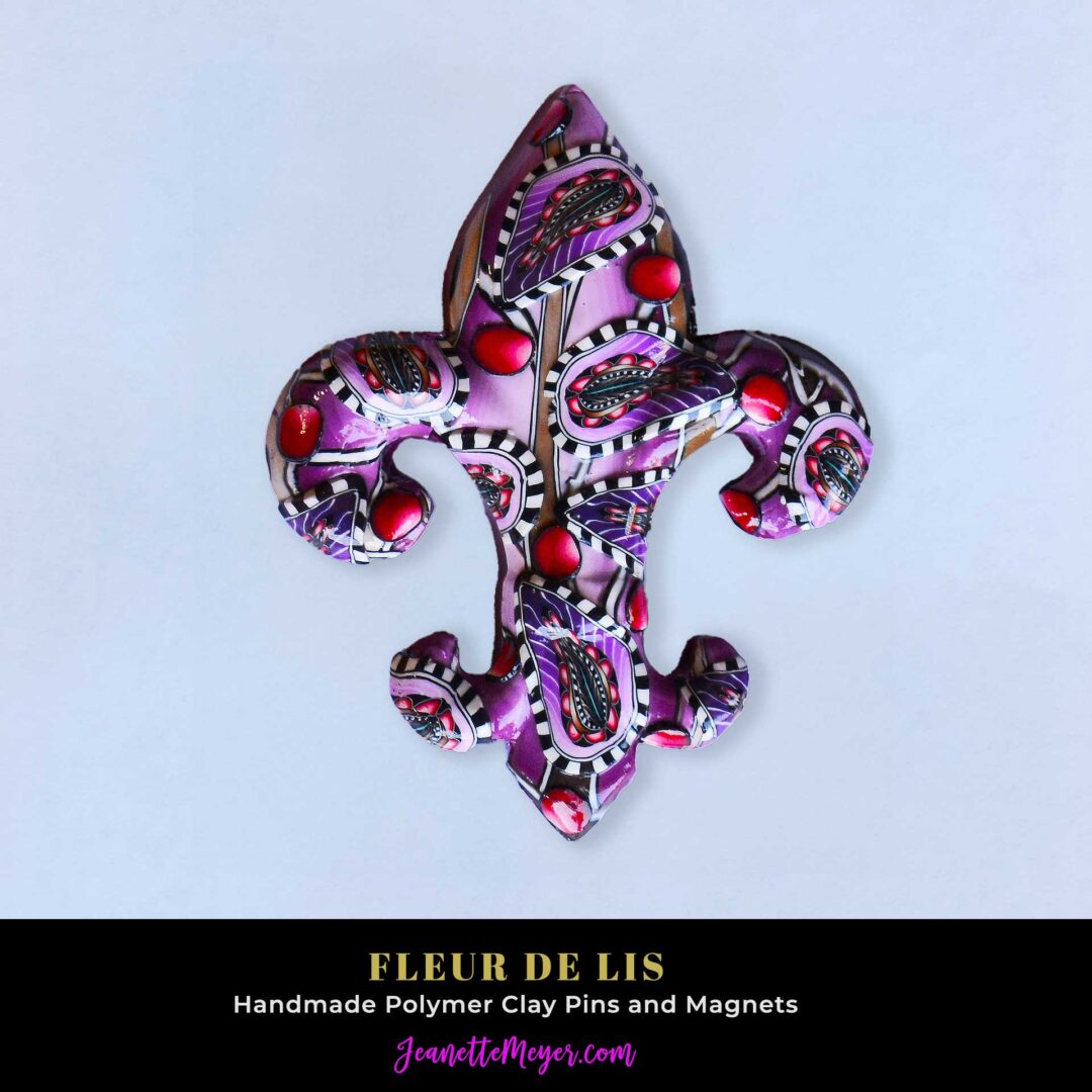 Handmade polymer clay fleur-de-lis pin by New Orleans artist Jeanette Meyer. A colorful, collectible design available as both pins and magnets.